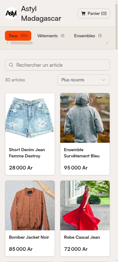 Boutique publique shopi.mg sur téléphone : nom du commerce, panier, filtres par famille d'articles et catalogue en grille avec les prix en ariary